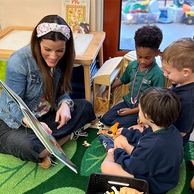 Teacher working with student